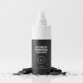 1 liter gentle charcoal face wash bottle with activated charcoal pieces